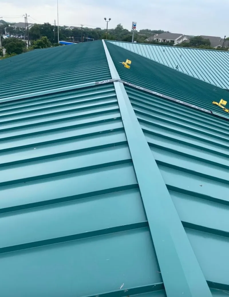 Green commercial metal roof ridge and valley for Metal Roof Repair in Clifton Heights